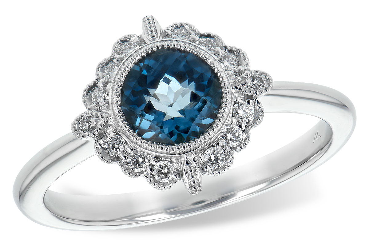 K244-01485: LDS RG .93 BLUE TOPAZ 1.05 TGW